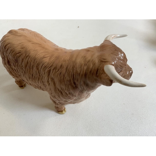 56 - Beswick Highland cattle. A Bull and a Cow with horns also with a calf. In gloss finish. Bull and cow... 