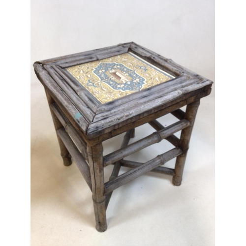 A small bamboo table with tile top. a/F also with a copper trivet W