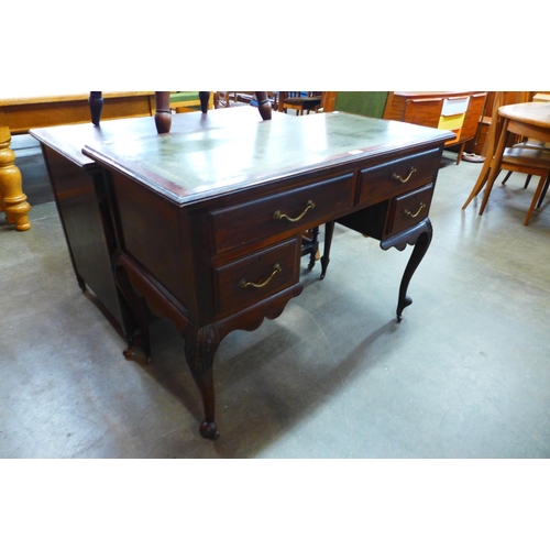 93 - A French style mahogany kneehole desk