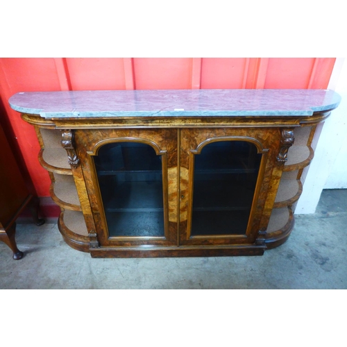 103 - A Victorian walnut and marble topped credenza