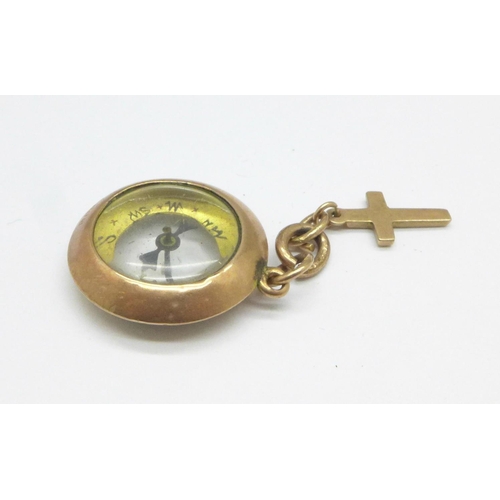 1063 - A 9ct gold compass fob, 4.6g