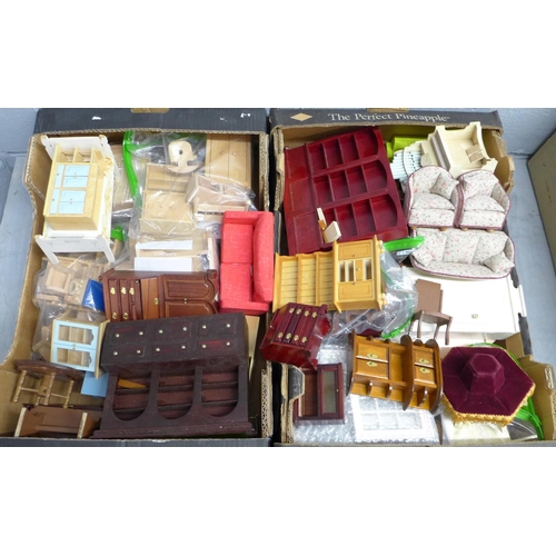 1104 - Two boxes of dolls house furniture**PLEASE NOTE THIS LOT IS NOT ELIGIBLE FOR POSTING AND PACKING**