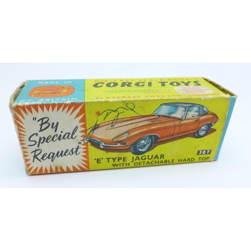 615 - A Corgi Toys 307 E Type Jaguar, boxed, a/f, no hard top