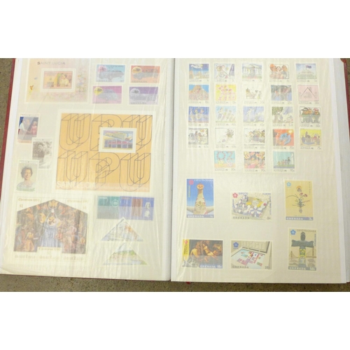 676 - Stamps; QEII Commonwealth unmounted mint stamps in 60 page stock book, mainly in sets