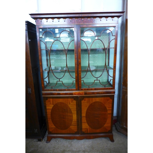 80 - An Edward VII Sheraton Revival inlaid mahogany display cabinet