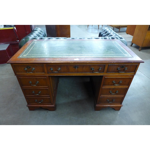 116 - A yew wood pedestal desk