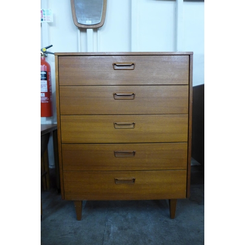 129 - A teak chest of drawers