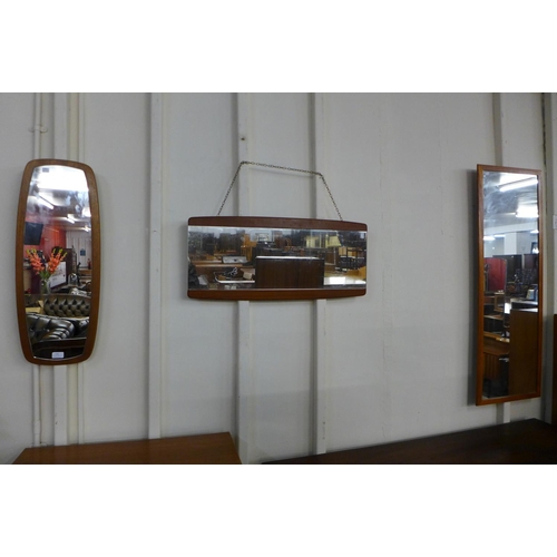 130 - Three teak framed mirrors