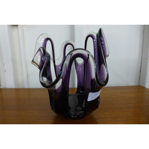 132 - A hand blown amethyst pierced glass vase