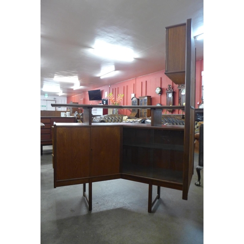 135 - A teak and Formica corner bar