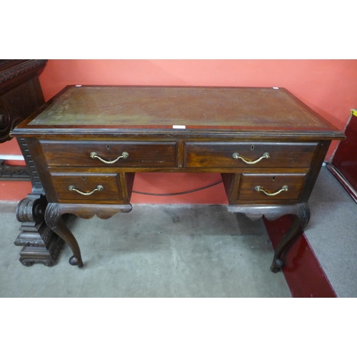 93 - A French style mahogany kneehole desk