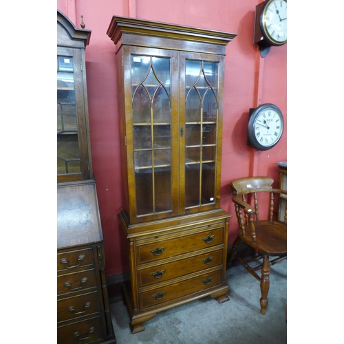 95 - A George III style yew wood bookcase