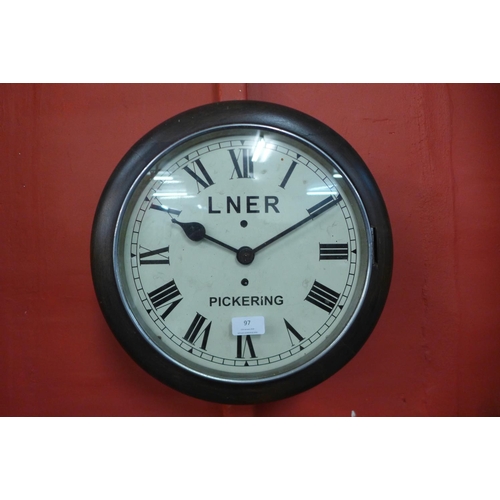 97 - A beech circular wall clock, bearing LNER Pickering inscription to the dial