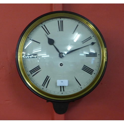 98 - A Victorian style mahogany convex wall clock