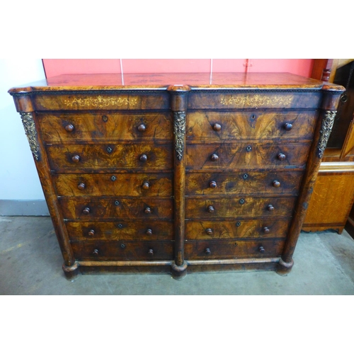 81 - A Victorian walnut bank of drawers