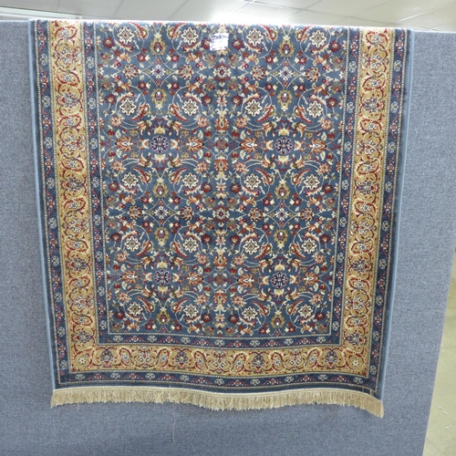 1409 - A duck egg blue ground Kashmir style carpet - all over floral pattern with gold border - 1.7m x 1.2m