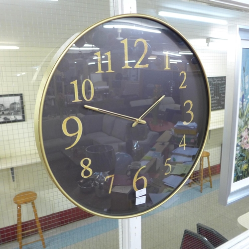 1872 - A gilt cased wall clock with black dial (2017824)   #