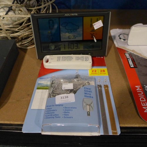 3138 - An Acurite weather station and a Command damage free hanging kit