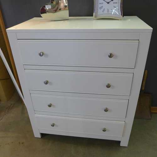 1429 - A cream painted chest of drawers