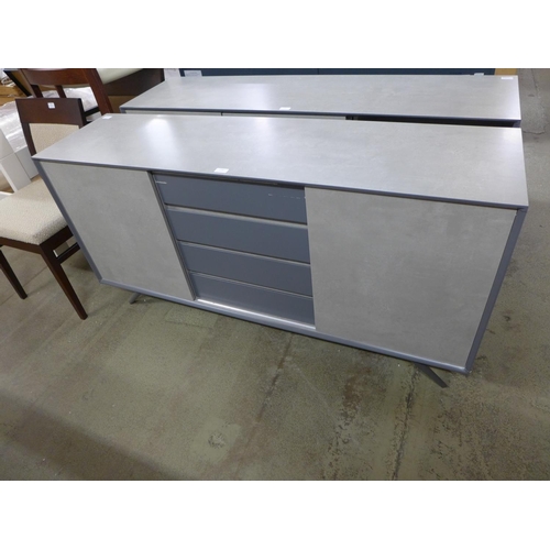 1305 - A two door, four drawer grey sideboard - marked