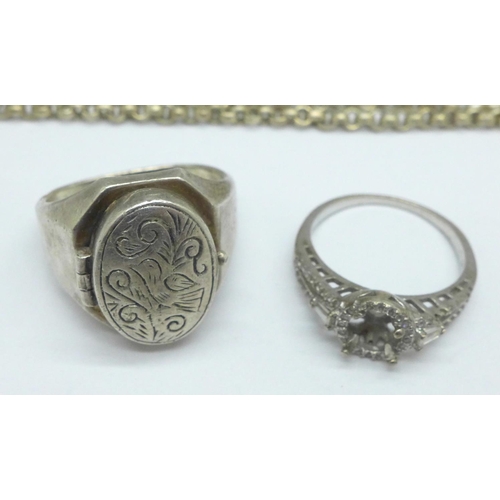 1001 - A silver 'poison' ring, part gold ring set with opal, a/f, two silver chains, a silver cross pendant... 