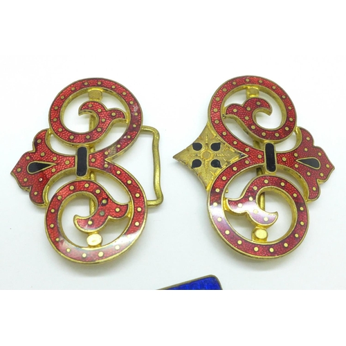 1003 - Three Edwardian enamel buckles and a dress clip