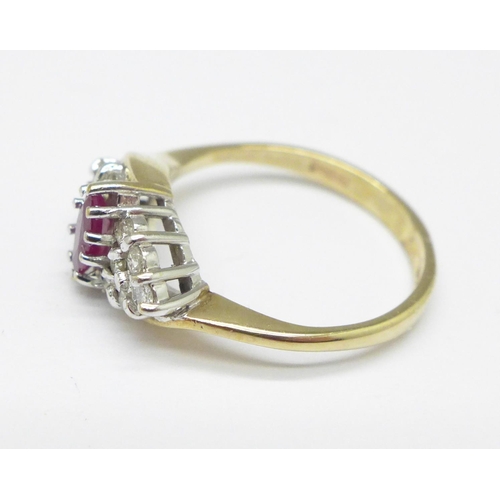 1014 - A 9ct gold, ruby and diamond ring, 2g, I