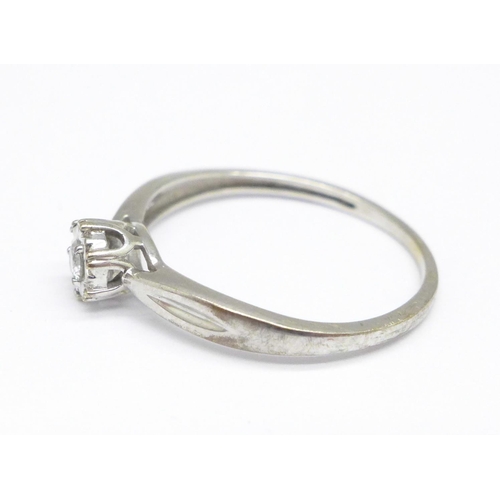 1028 - A white metal and diamond ring, 1.3g, N