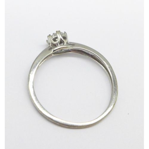 1028 - A white metal and diamond ring, 1.3g, N