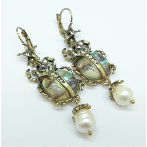 1032 - A pair of scarab beetle earrings