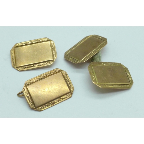 1039 - A pair of 9ct gold cufflinks, 2.8g, one a/f