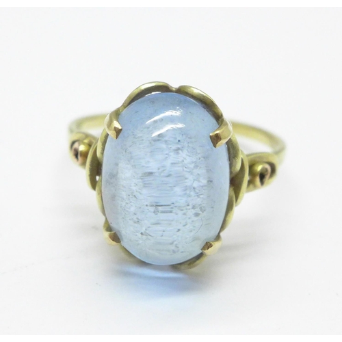 1042 - A yellow metal stone set ring, 3.9g, O