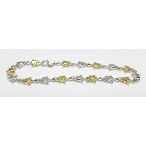 1073 - A two colour gold bracelet, marked 750, 4.2g