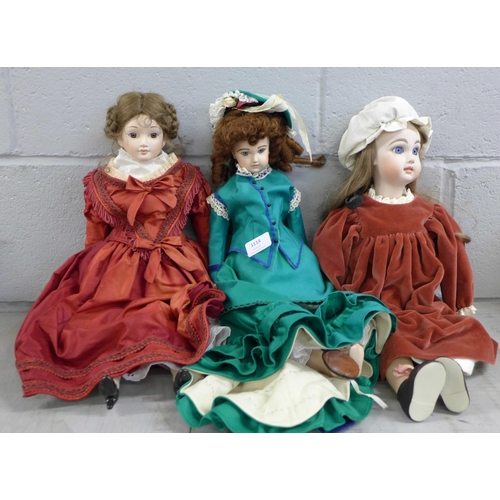 1114 - Three porcelain dolls