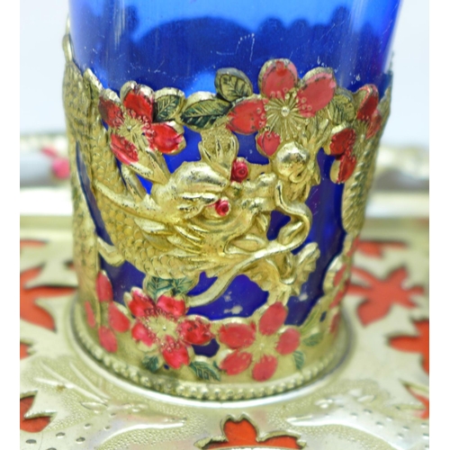 685 - Six oriental tea glass holders on a tray, decorated with dragons and blossom, one glass a/f