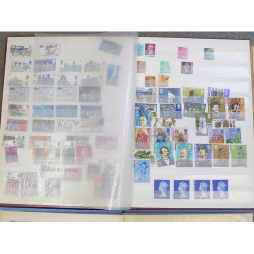 687 - Three albums of British and worldwide stamps including mint