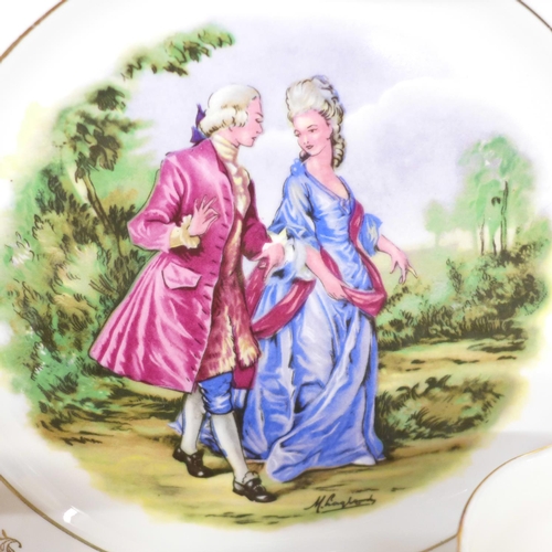 689 - A twenty-one piece 22ct gold painted tea service and two plates