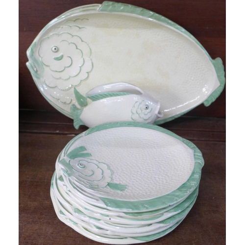 697 - Six fish plates, serving plate and sauce jug, some a/f