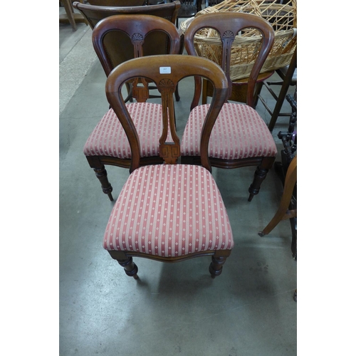 264 - A set of three Victorian mahogany balloon back dining chairs