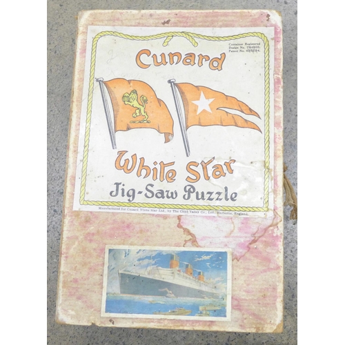 719 - Cunard related cruise and ocean liner related items including a Chad Valley and Valentines jigsaw pu... 