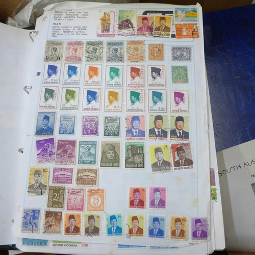 726 - A box of worldwide stamps in four albums and loose albums, etc.