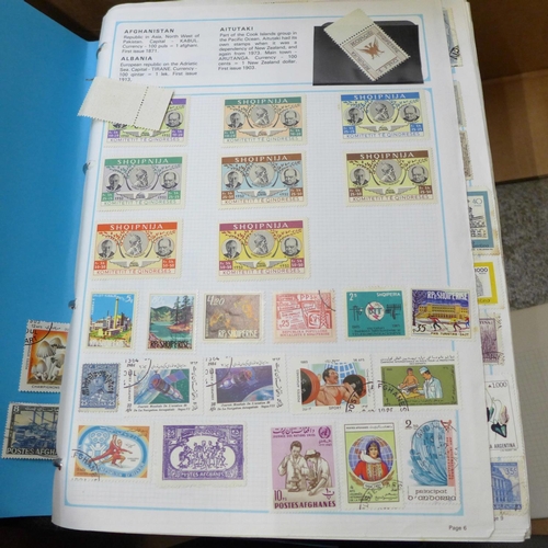 726 - A box of worldwide stamps in four albums and loose albums, etc.