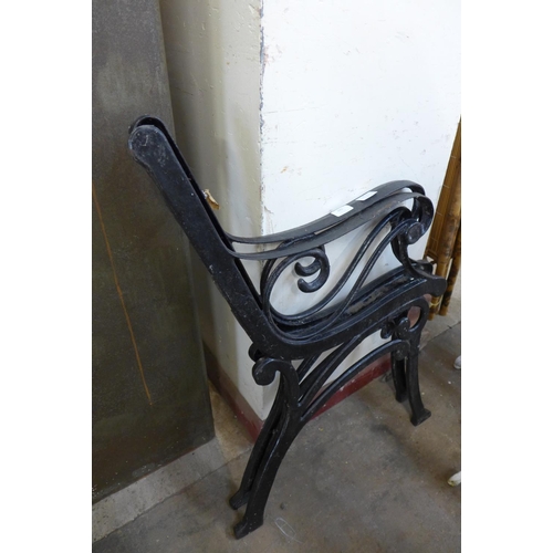 287 - A pair of cast steel bench ends