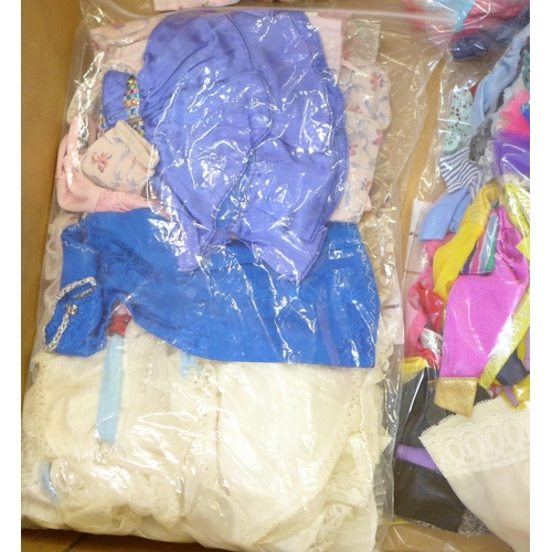 747 - A box of 1980's Barbie dolls with clothes and accessories