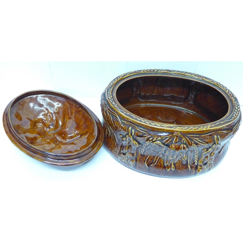 762 - A Portmeirion Pottery No. 1 size treacle glaze game pie covered dish