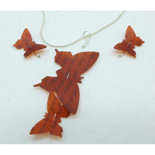 798 - A silver mounted butterfly pendant and pair of earrings