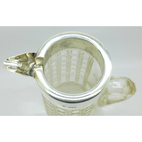 799 - A silver mounted glass lemonade jug