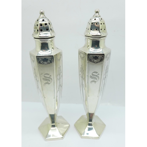 801 - A pair of sterling silver pepperettes, 106g