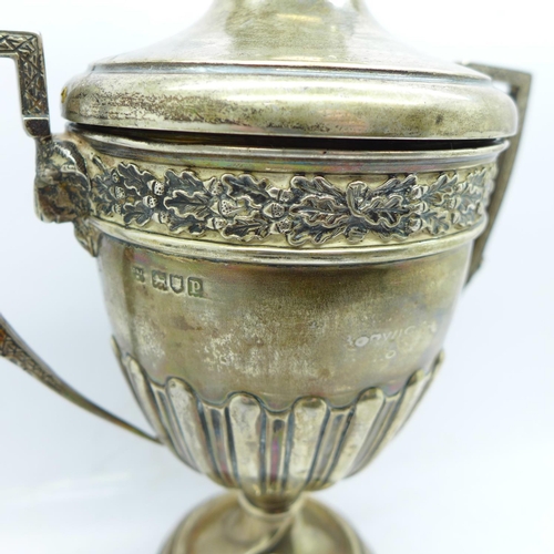 803 - A silver trophy with gilt interior, London 1910, a/f, stem creased, no inscription, 467g, 24cm