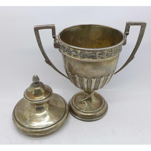 803 - A silver trophy with gilt interior, London 1910, a/f, stem creased, no inscription, 467g, 24cm